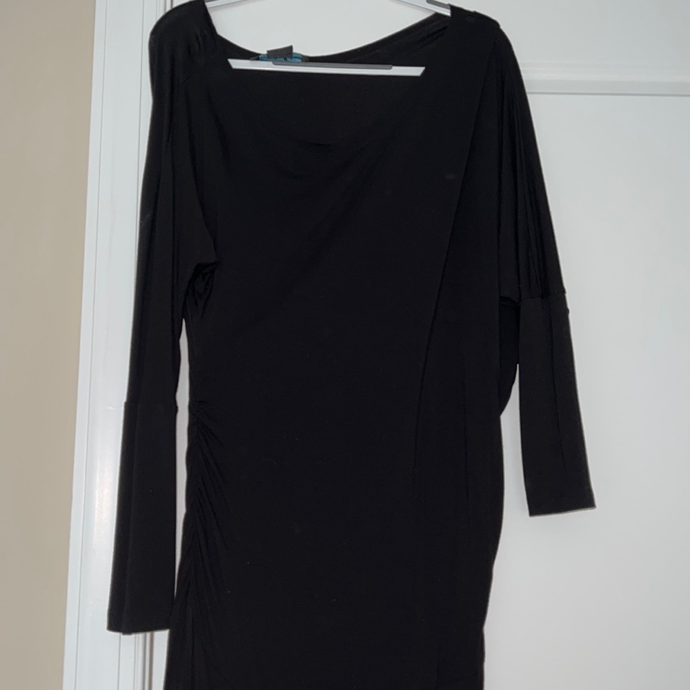 Beautiful long black dress with side slit. Rouging on the side.